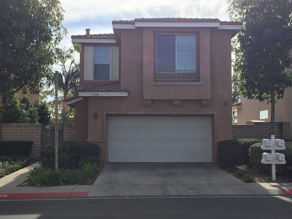 Front Entrance/Garage/Driveway