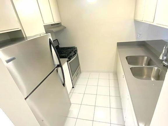 4th image of 12756 Matteson Ave #105