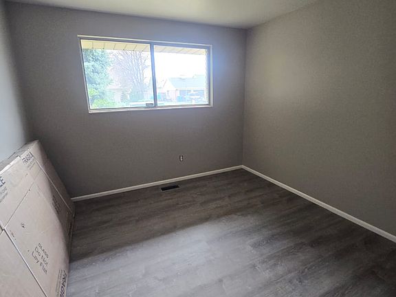 Bedroom 1 - with beautiful new flooring and fresh paint