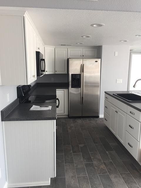 Open layout kitchen with separate dining area
