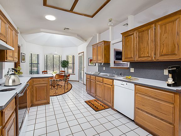 Kitchen with oak cabinets