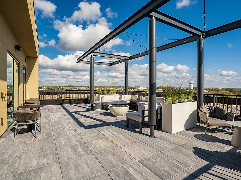 Gather at our rooftop wine lounge with stunning views of Woodbury.