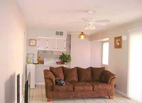 tiled throughout,open to kitchen