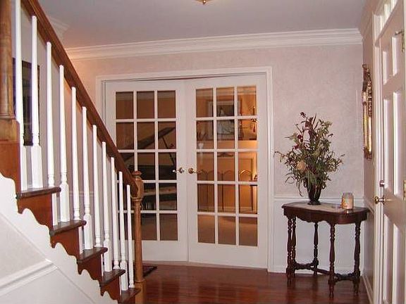 Entrance Foyer with French doors to Living Room