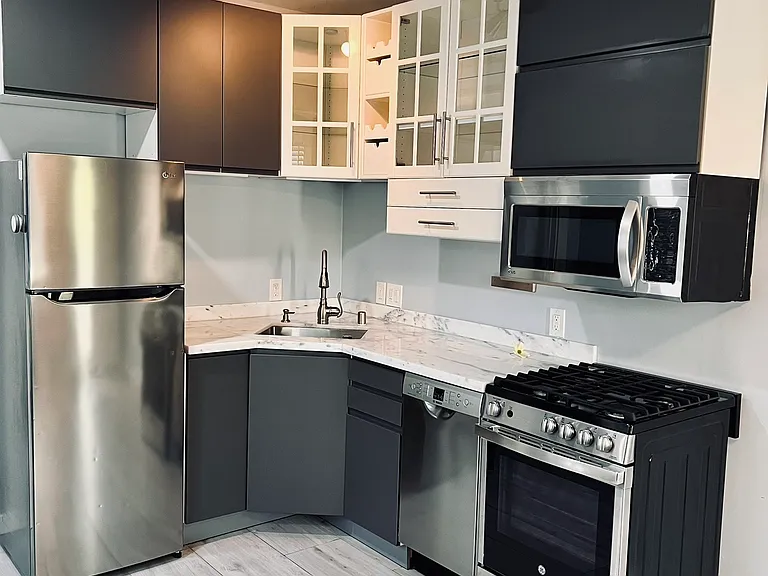 Gorgeous porcelain tile floors, track lights, ultra-quiet LG/BOSCH stainless steel appliances
