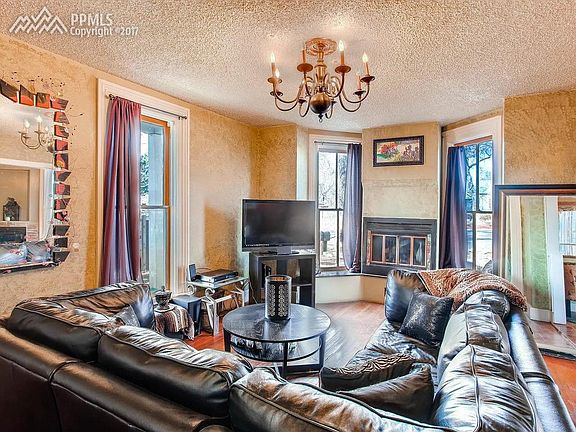 ...3 large windows which flood the space with light...