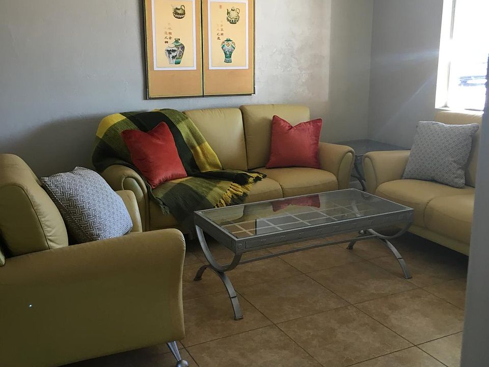 Large sunny living room with lots of natural light