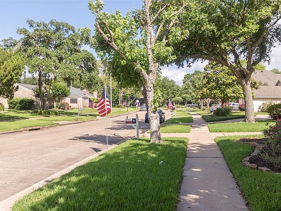 Memorial Day weekend and the whole street is covered in Flags! Neighbors got together to coordinate, don't you want to live on this street?