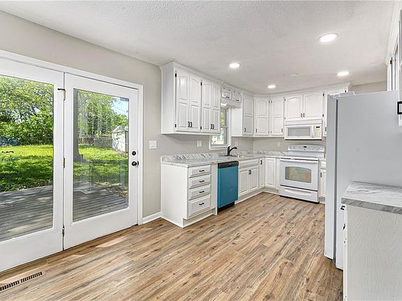 5th image of 8746 N Troost Ave