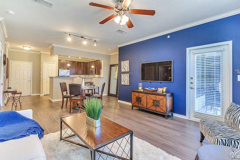 Large Living Room with open concept kitchen and ceiling fan