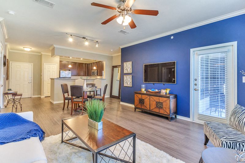 Large Living Room with open concept kitchen and ceiling fan