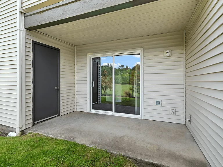 Apartment home with a private covered patio and outdoor living area. Apartment home with a private covered patio and outdoor living area.