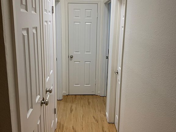 Corridor to bedrooms on each side.