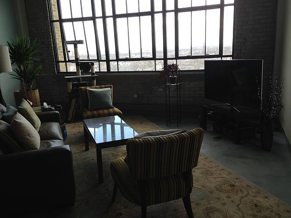 huge open floor plan, 12 foot ceilings, concrete floors