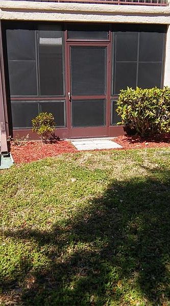 Back - off screened-porch 
