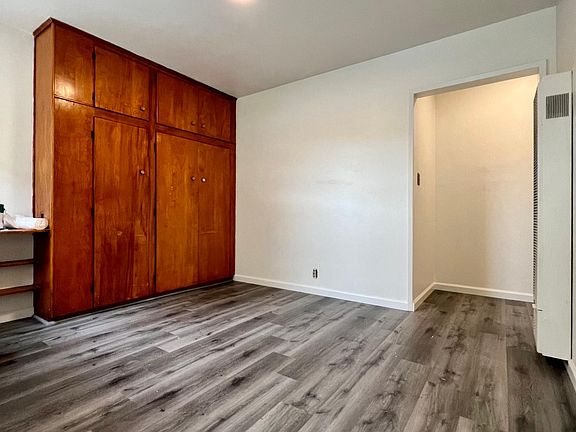Bedroom with storage closets.