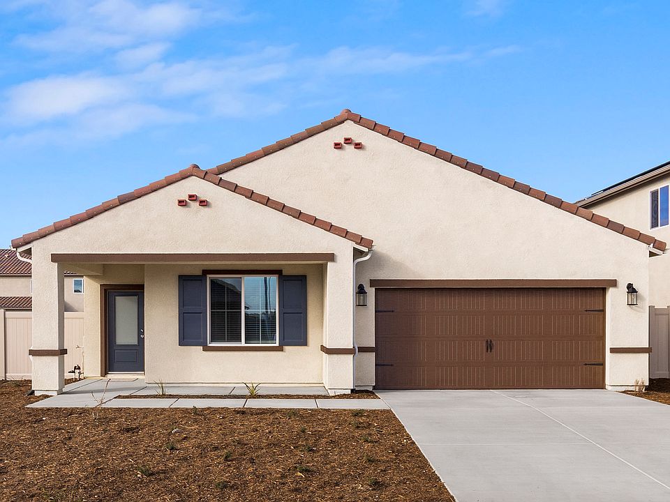 The Laguna is a beautiful single story home with stucco.