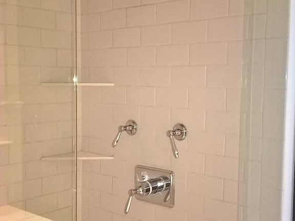 Beautiful modern bathroom with rain shower.