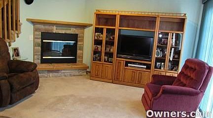 Living Room w/ Stoned Fireplace