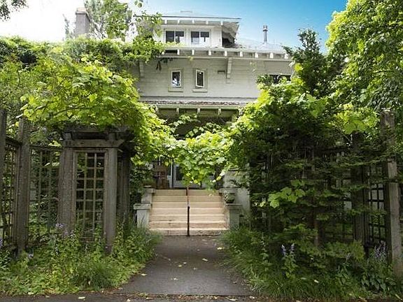 Front Entrance Through the Grape Arbor