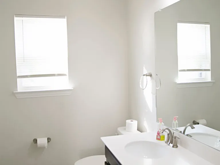 Double vanity bathroom on the right side of the home.