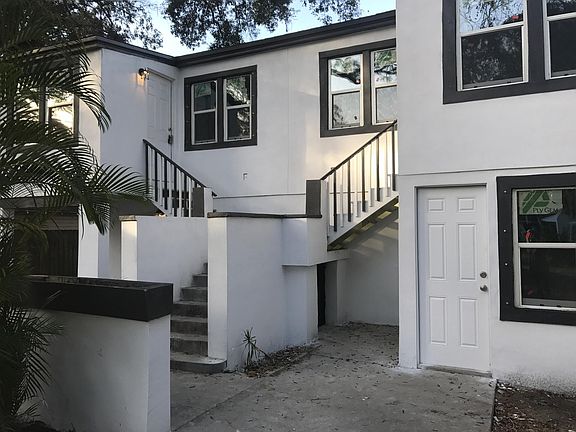 Lower door on right is Apartment B Laundry and storage accessed through garage via a keyed entry.