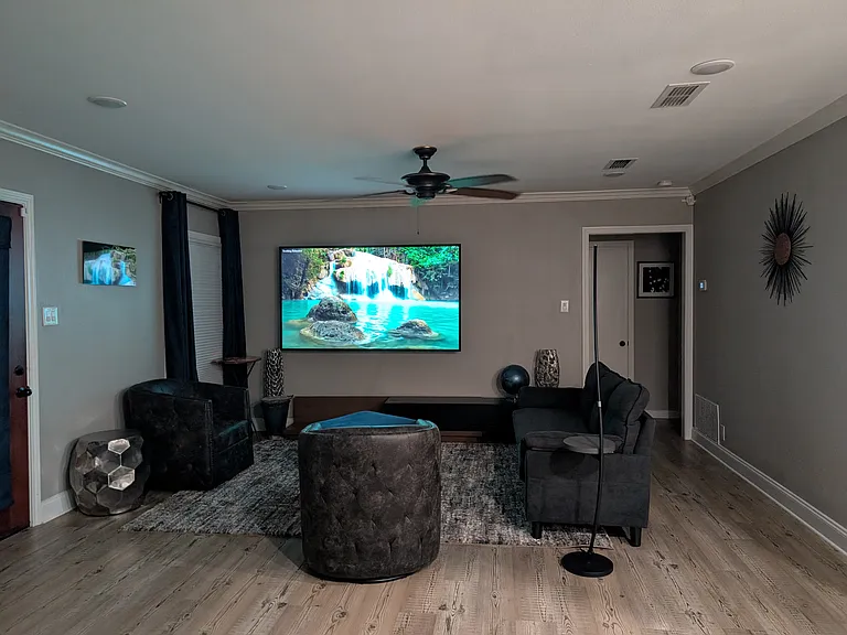 Living Room 1-Large screen to enjoy movies or watch sports.