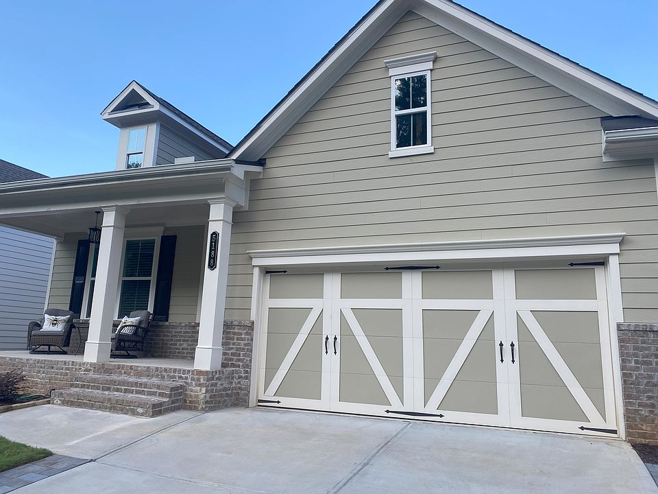 Front of home with 2-car garage