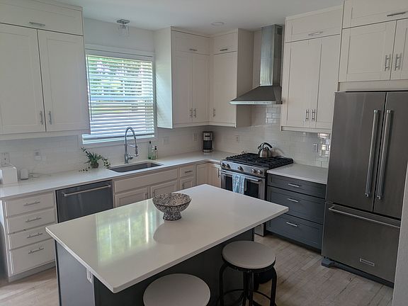 Gas stove, dual temp wine fridge, refrigerator with internal filtered water and wine holder