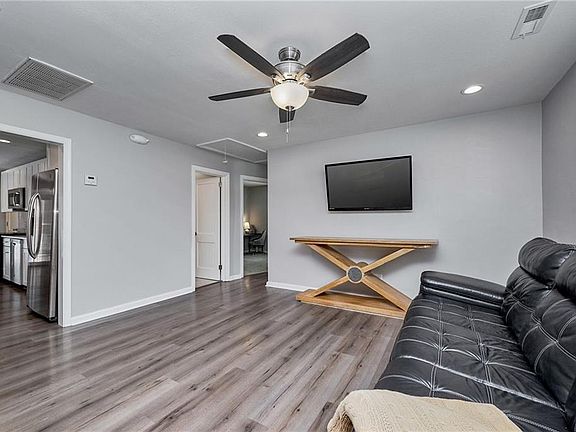 Living room view looking right upon entering front door.