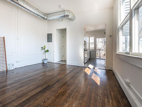 Living Room with Kitchen and Balcony