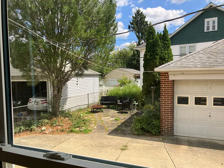 patio and 1/2 of 2 car garage.