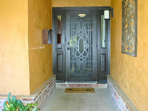 Beautiful front door area with security screen