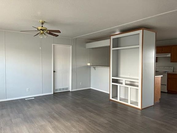 Family Room/Entertainment Center 

Door to Primary Bedroom