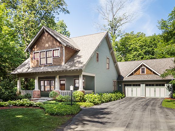 House sits on a wooded lot