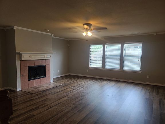 Vinyl Plank Floors and a Wood Burning Fireplace