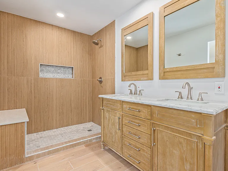 PRMIARY ENSUITE WITH DOUBLE VANITY AND WALK-IN SHOWER WITH SEATING