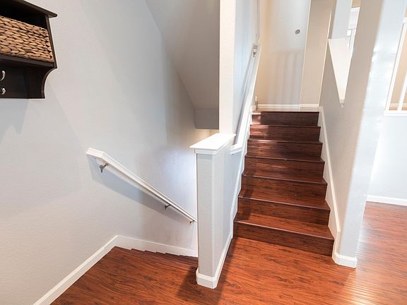 Stairs to attached garage and 2nd level