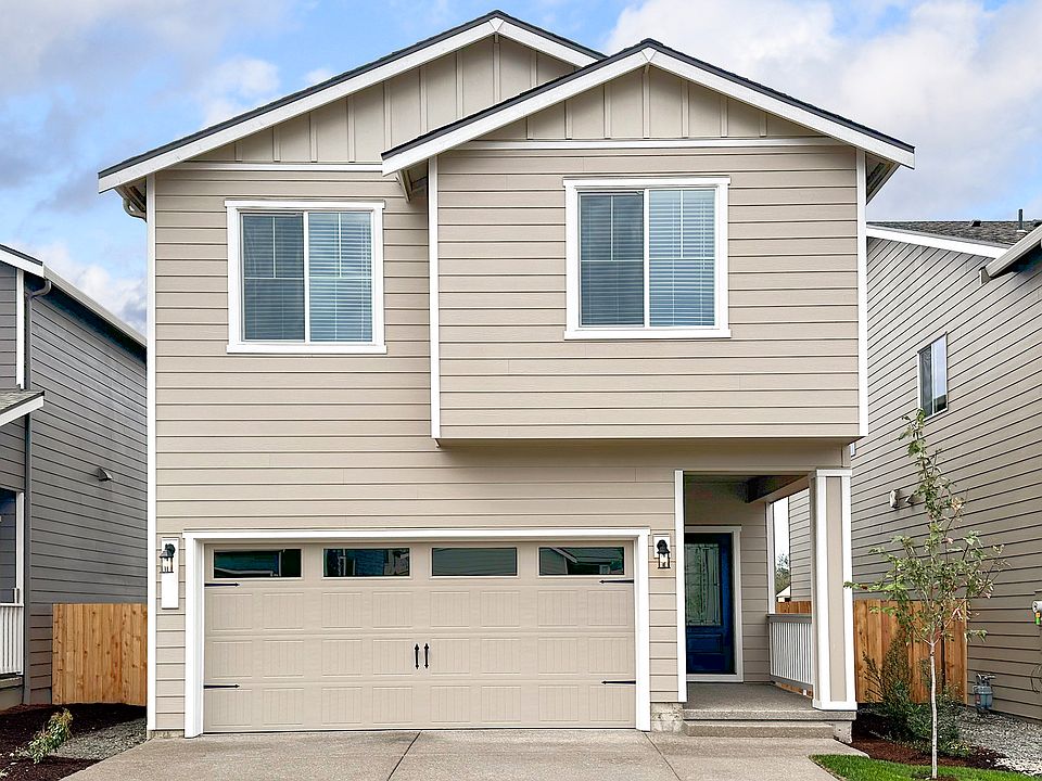 The Hood is a beautiful two story home with siding.