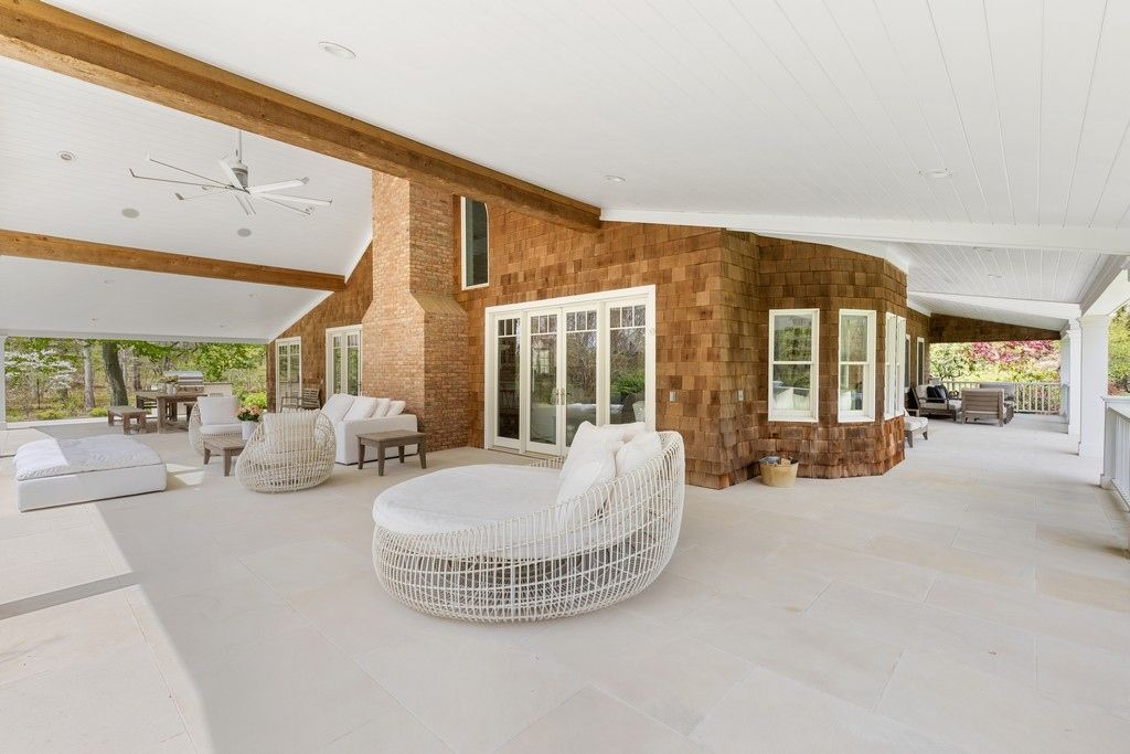 Wrap -around covered sandstone terrace