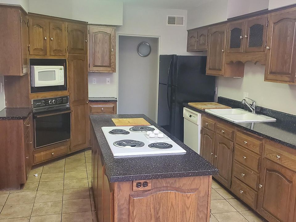 Large Kitchen. New fridge and resurfaced counter tops