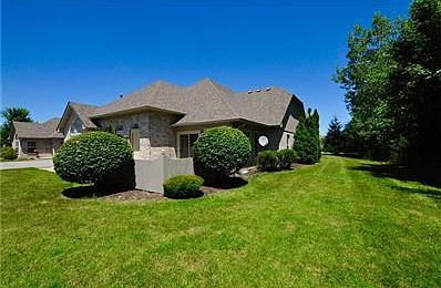 Exterior - Side View with Tree-Line - Extra Space for Pets or Playing