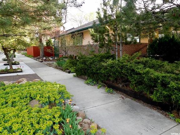 Walk to your front entry, enter garage & street parking on Lake St.