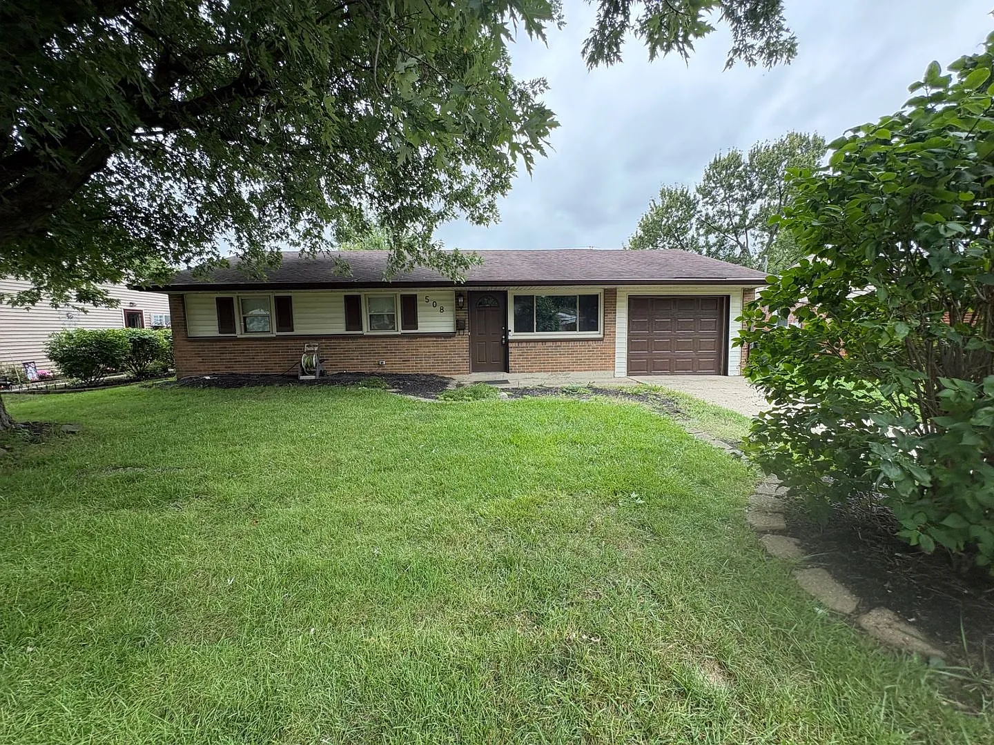 Updated 3BR Home with Hardwood Floors, Garage & Large Backyard 508 Amor Pl, Vandalia $1,400/mo — Photo 1