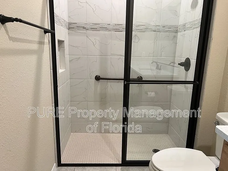 10376 SW 99th St — Photo 55