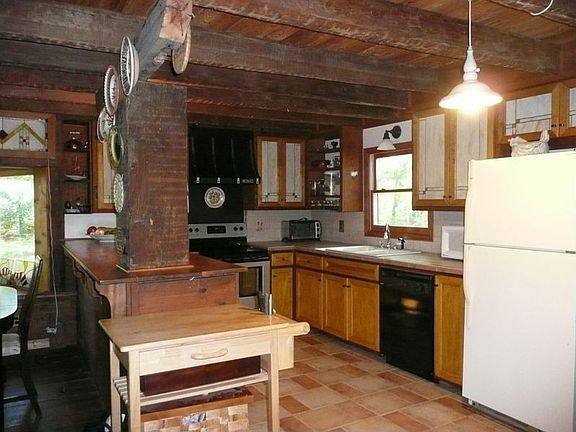 Custom Tile, Electric Smooth Top Cooking & Unique Large Pantry 