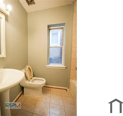 3619 Park Heights Ave — Photo 6