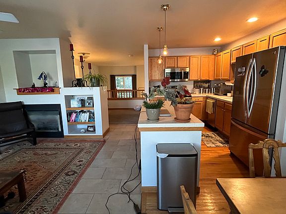 Shared kitchen, dining, den area