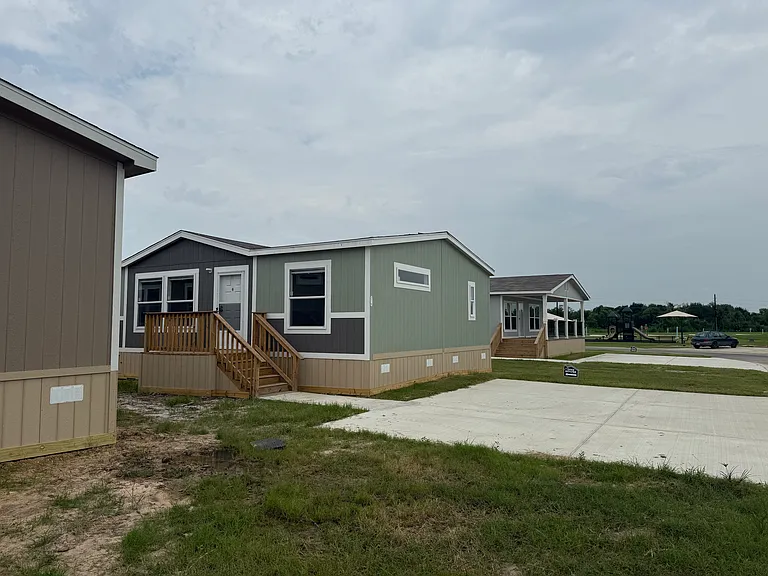 Front Exterior- *Bottom skirting will be painted to match home color