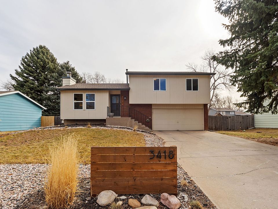 Charming exterior with well-maintained landscaping and a welcoming entrance.